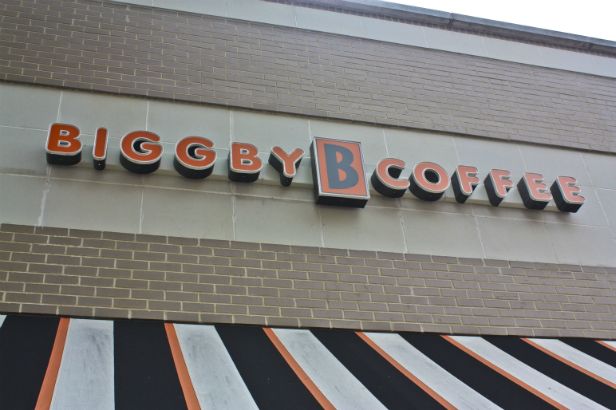 Bigby Coffee Arlington Heights.  LED lighted channel letters on a raceway painted to match the building facade. 